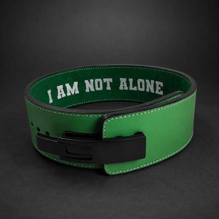 Green and black custom lever powerlifting belt with black lever and "I AM NOT ALONE" text